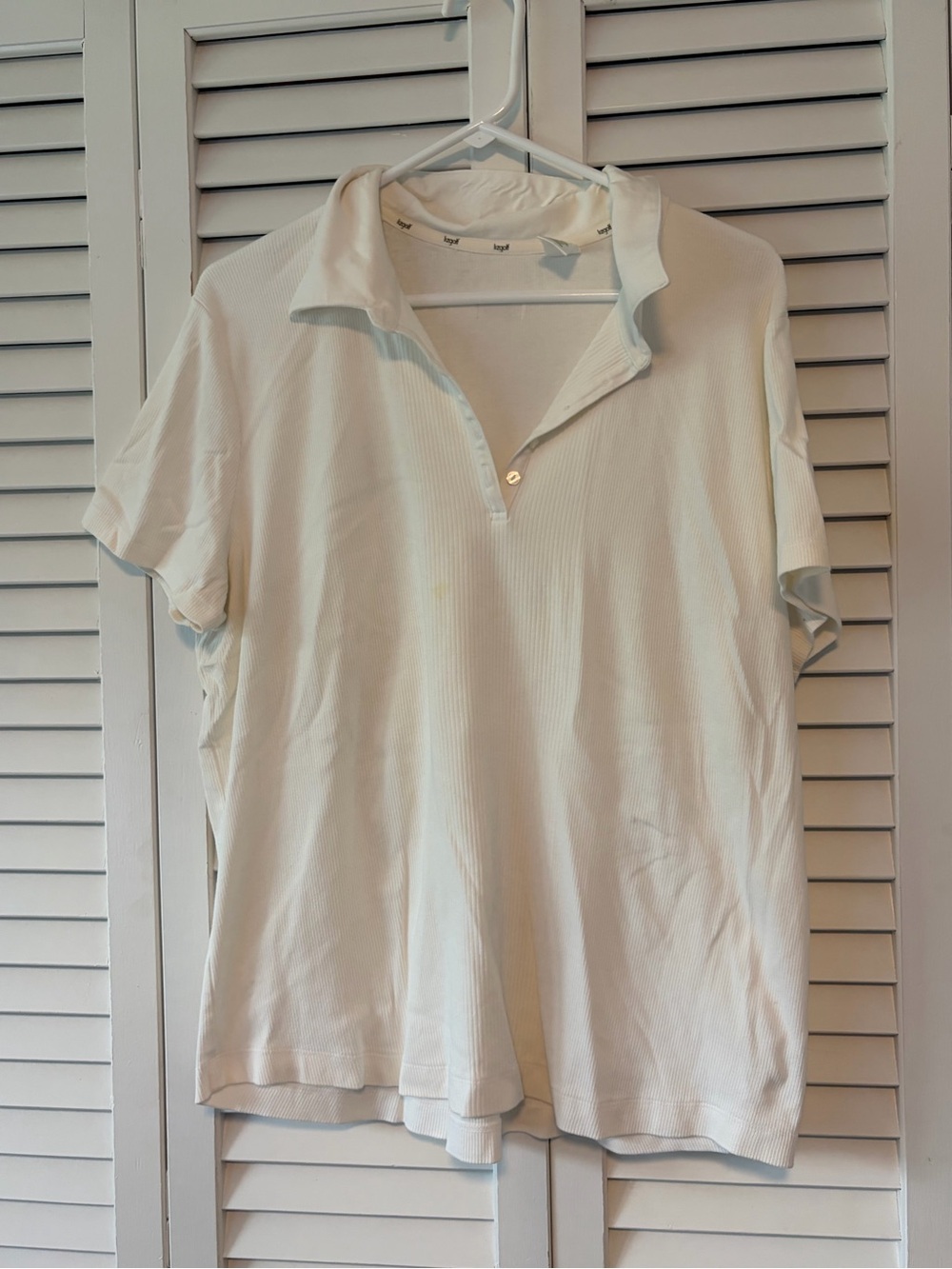 Ladies Cream Short-Sleeve Polo Shirt with Subtle Texture